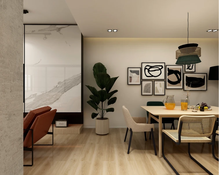 Comedor moderno y elegante con una mesa de madera clara y sillas de diseño contemporáneo. Las paredes están decoradas con cuadros artísticos en tonos neutros, mientras que una planta natural añade frescura al ambiente. La iluminación suave resalta los detalles y crea un espacio acogedor y equilibrado, ideal para interiores renovados